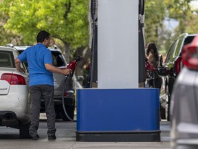 Customers refuel at a Costco gas station in Concord, California, U.S., on Wednesday, June 22, 2022. President Joe Biden called on Congress to suspend the federal gasoline tax, a largely symbolic move by an embattled president running out of options to ease pump prices weighing on his party's political prospects.