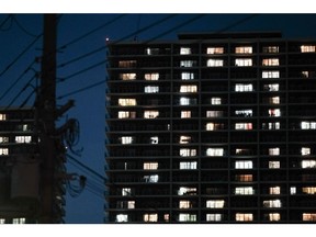 A residential building at night in Yao. Japan's government is urging residents to reduce electricity consumption as the unusual heat threatens to sap electricity supply. Photographer: Soichiro Koriyama/Bloomberg