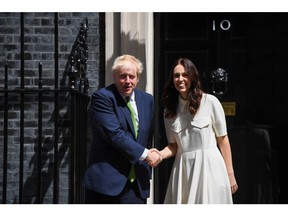 Boris Johnson, UK's prime minister, left, and Jacinda Ardern, New Zealand's prime minister, ahead of their bilateral meeting at 10 Downing Street in London, UK, on Friday, July 1, 2022. Johnson's deputy chief whip has resigned from his position as a government enforcer due to an incident involving excessive drinking, adding to the premier's woes as he returns to the UK.