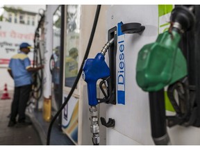 Fuel nozzles at a gas station in New Delhi, India, on Sunday July 10, 2022. India is scheduled to release consumer price index (CPI) figures on July 12.