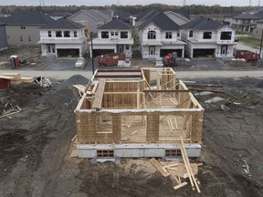 Canada Mortgage and Housing Corporation says the annual pace of housing starts in June slowed compared with May.