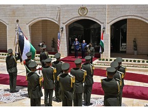 US President Joe Biden (C-L) is received by Palestinian president Mahmud Abbas (C-R) during a welcome ceremony at the Palestinian Muqataa Presidential Compound in the city of Bethlehem in the occupied West Bank on July 12, 2022.  Photographer: Mandel Ngan/AFP/Getty Images