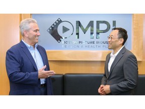 MPI CIO Joel Manfredo (left) shares upcoming plans to deploy Laserfiche as an enterprise solution with Laserfiche CIO Thomas Phelps.