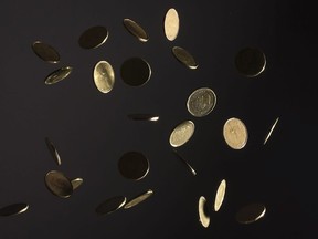 Falling Canadian dollar coins, also called "loonies", are pictured in North Vancouver, B.C., Wednesday, May 29, 2019.