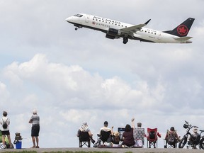 An Air Canada jet takes off from Trudeau Airport in Montreal, Thursday, June 30, 2022. Canadian airlines and airports claimed top spots in flight delays over the weekend, notching more than nearly any other around the world.