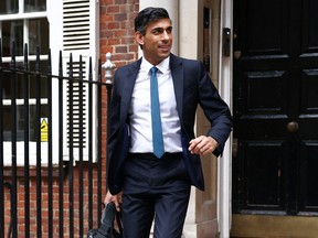 Conservative leadership candidate Rishi Sunak leaves an office building in London, Britain.