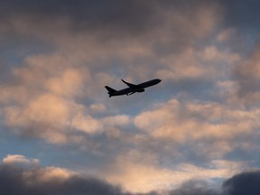 A Cargojet Boeing 767 takes off at Edmonton International Airport at sunset in Nisku.