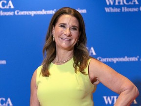 FILE - Melinda Gates poses for photographers as she arrives at the annual White House Correspondents' Association Dinner in Washington, Saturday, April 30, 2022. The WTA women's professional tennis tour and the Bill and Melinda Gates Foundation are partnering to raise awareness about -- and money for -- women's health and nutrition around the world. They also plan to work together to promote gender equality and female leadership. Melinda French Gates tells the AP that the foundation sees WTA players as role models who "can speak to these issues because they know them."