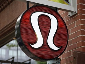 FILE - This June 5, 2017, file photo, shows a Lululemon Athletica logo outside a store on Newbury Street in Boston. Lululemon workers in Washington, D.C. have filed for a union election, joining the ranks of workers at other major companies pushing to organize their facilities. The petition was filed Wednesday, July 20, 2022, by a group that calls itself the Association of Concerted Educators.