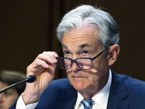 FILE - Federal Reserve Chairman Jerome Powell speaks to the Senate Banking, Housing and Urban Affairs Committee, as he presents the Monetary Policy Report to the committee on Capitol Hill, on June 22, 2022, in Washington. With inflation raging at a four-decade high and the job market strong, the Fed is under pressure to raise interest rates aggressively.