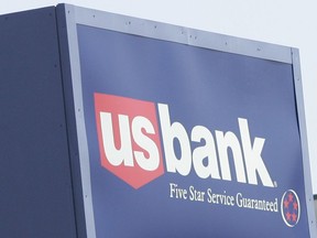 FILE - The logo of Minnesota-based US Bank is shown at the Bloomington, Minn., branch, Monday, July 16, 2007. For more than a decade, US Bank pressured its employees to open fake accounts in their customers' names in order to meet unrealistic sales goals, the Consumer Financial Protection Bureau said Thursday, July 28, 2022, in a case that is deeply similar to the sales practices scandal uncovered at Wells Fargo last decade.