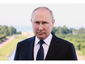 Vladimir Putin Photographer: Mikhail Metzel/AFP/Getty Images