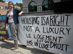 A Montreal community activist protests against 