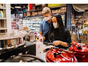 A young couple shopping at grocery store