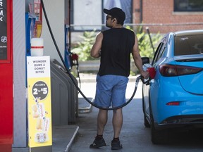 Canada's inflation rate reached 8.1 per cent in June on a year-over-year basis as prices for most goods and services continued to rise. A commuter pumps gas into their vehicle at a Esso gas station in Toronto on Tuesday, June 15, 2021.
