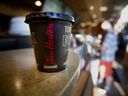 Tim Hortons has reached a proposed settlement in multiple class action lawsuits in which he claims the restaurant's mobile app has violated customer privacy.