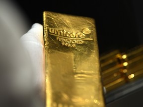 A bar of gold with a Umicore hallmark. The company specializes in chemicals and materials.