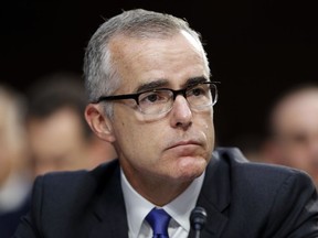 FILE - Then FBI acting director Andrew McCabe listens during a Senate Intelligence Committee hearing about the Foreign Intelligence Surveillance Act, on Capitol Hill, June 7, 2017, in Washington. The commissioner of the Internal Revenue Service has asked the Treasury Department's inspector general to immediately review the circumstances surrounding intensive tax audits that targeted ex-FBI Director James Comey and ex-Deputy Director Andrew McCabe.