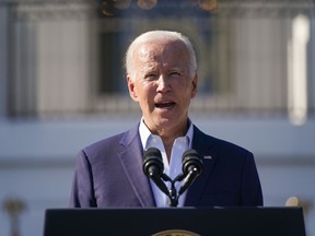 President Joe Biden speaks on the South Lawn of the White House, Monday, July 4, 2022, in Washington. With his party struggling to connect with working class voters, President Joe Biden on Wednesday plans to use the backdrop of the Iron Workers Local 17 Training Center in Cleveland to tell workers his administration's policies would shore up funding for roughly 200 multiemployer pensions.