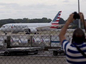 FILE - An American Airlines flight that took off from Miami sits on the tarmac at the Jose Marti International Airport in Havana, Cuba, on Nov. 15, 2021. The U.S. government is giving American Airlines permission to resume flights to five cities in Cuba outside the capital of Havana.