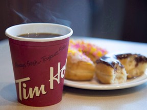 A coffee and donut from Tim Horton's is seen at a Coquitlam, B.C., location on April 26, 2018.