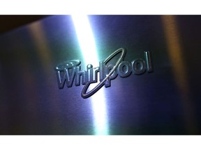 The Whirlpool Corp. logo sits on a fridge freezer appliance during the IFA International Consumer Electronics Show in Berlin, Germany, on Friday, Sept. 4, 2015. IFA is Europe's largest consumer electronics show and runs Sept. 4-9. Photographer: Chris Ratcliffe/Bloomberg