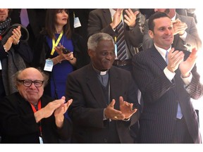 Actor Danny Devito, left, cardinal Peter Turkson, center, and Eric Harr at the Laudato Si Challenge Demo Day at the Aula Magna of the Pontifical Urbaniana University on Dec. 4, 2017 in Rome, Italy.
