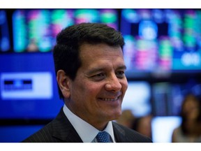 Felipe Bayon, chief executive officer of Ecopetrol SA, smiles on the floor of the New York Stock Exchange (NYSE) in New York, U.S., on Friday, Aug. 24, 2018. U.S. stocks rose, while the dollar deepened losses and Treasuries turned higher after the Federal Reserve chair signaled the central bank has no intention of accelerating the pace of rate hikes.