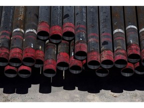 Oil drill pipe casings sit at a Colgate Energy LLC site in Reeves County, Texas, U.S., on Wednesday, Aug. 22, 2018. Spending on water management in the Permian Basin is likely to nearly double to more than $22 billion in just five years, according to industry consultant IHS Markit. Photographer: Callaghan O'Hare/Bloomberg