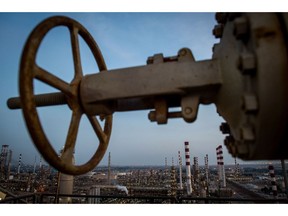 A valve control wheel sits on a high platform at the Persian Gulf Star Co. (PGSPC) gas condensate refinery in Bandar Abbas, Iran, on Wednesday, Jan. 9. 2019. The third phase of the refinery begins operations next week and will add 12-15 million liters a day of gasoline output capacity to the plant, Deputy Oil Minister Alireza Sadeghabadi told reporters. Photographer: Ali Mohammadi/Bloomberg