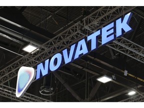 An illuminated logo sits on display outside the Novatek PJSC pavilion ahead of the St. Petersburg International Economic Forum (SPIEF) in St. Petersburg, Russia, on Wednesday, June 5, 2019. Over the last 21 years, the Forum has become a leading global platform for members of the business community to meet and discuss the key economic issues facing Russia, emerging markets, and the world as a whole.