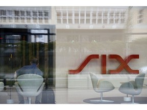 A SIX logo sits in the entrance hall of the Six Swiss Exchange AG in Zurich, Switzerland, on Thursday, Aug. 22, 2019. In a move that has implications for Brexit, Switzerland disallowed the trading of its shares on the bloc's bourses as of July 1 to prevent a drop in liquidity as it faced the expiry of its recognition under European Union rules. Photographer: Stefan Wermuth/Bloomberg