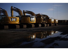 Caterpillar excavators for sale at a dealership in Louisville, Kentucky. Photographer: Luke Sharrett/Bloomberg
