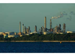 The Esso Fawley Oil Refinery, operated by Exxon Mobil Corp., stands in Fawley, U.K., on Thursday, May 14, 2020. Oils historic plunge below $0 a barrel pummeled portfolios, broke risk models and changed the way the worlds most important commodity is traded. Photographer: Luke MacGregor/Bloomberg