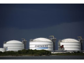 Storage tanks stand the Sabine Pass LNG Export Terminal ahead of Hurricane Laura in Sabine Pass, Texas, U.S., on Tuesday, Aug. 25, 2020. Hurricane Laura is poised to become a roof-ripping Category 3 storm when it comes ashore along the Texas-Louisiana coast, threatening to inflict as much as $12 billion of damage on the region and potentially shutting 12% of U.S. refining capacity for months.