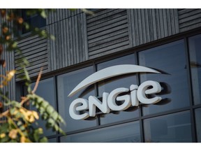 An Engie SA logo sits on display at the French energy giant's Crigen gas, new energy and emerging technology research and development center in Stains, France, on Tuesday, Sept. 22, 2020. Veolia Environnement SA last month offered to buy 29.9% of Suez SA from French utility Engie for 2.9 billion euros ($3.4 billion), the first step to taking full control. Photographer: Cyril Marcilhacy/Bloomberg