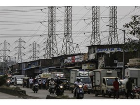 Electrical power lines in Mumbai, India. Photographer: Dhiraj Singh/Bloomberg