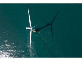 A wind turbine operates at Southwest Offshore Wind Farm in Buan, South Korea, on Thursday, March 25, 2021. The wind farm complex in the Southwest Sea will be expanded to 2.46 GW after 2027, according to Korea Offshore Wind Power Corp, a special purpose company formed by state-run Korea Electric Power Corp. and six other generators. Photographer: SeongJoon Cho/Bloomberg