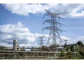Electricity transmission pylons at the Olkaria Geothermal Complex, operated by Kenya Electricity Generating Company Plc (Kengen), in Hells Gate National Park in Naivasha, Kenya, on Tuesday, May 18, 2021. Kenya gets nearly half of its electricity from geothermal plants, more than any other country, according to researcher Fitch Solutions, and it's on track to increase that to almost three-fifths by 2030. Photographer: Patrick Meinhardt/Bloomberg