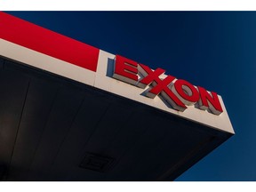 Signage at an Exxon Mobil gas station in El Cerrito, California, U.S., on Tuesday, July 27, 2021. Exxon Mobil Corp. is expected to release earnings figures on July 30. Photographer: David Paul Morris/Bloomberg