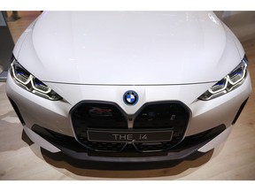 The BMW i4 electric vehicle on display at the IAA Munich Motor Show in Munich, Germany on Monday, September 6, 2021. The IAA, taking place in Munich for the first time, is Europe's first major in-person motor show since the coronavirus pandemic began. Photographer: Krisztian Bocsi/Bloomberg