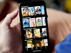 The Netflix Inc. application home screen on a smartphone arranged in the Brooklyn Borough of New York, U.S., on Saturday, Oct. 16, 2021. Netflix Inc. is scheduled to release earnings figures on October 19. Photographer: Gabby Jones/Bloomberg