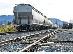Train cars near the U.S. border during a flood in Abbostford, British Columbia, Canada, on Wednesday, Nov. 17, 2021. Days of torrential rain have pelted British Columbia, triggering floods and landslides that have blocked the tracks of the nation's two major railways and washed away parts of its main east-west road artery, the Trans-Canada Highway. Photographer: Jimmy Jeong/Bloomberg