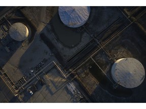 Storage tanks at the Torrance Refining Co. in Torrance, California, U.S., on Monday, Feb. 28, 2022. The U.S. and its allies are discussing a coordinated release of about 60 million barrels of oil from their emergency stockpiles after Russia's invasion of Ukraine pushed crude prices above $100. Photographer: Bing Guan/Bloomberg