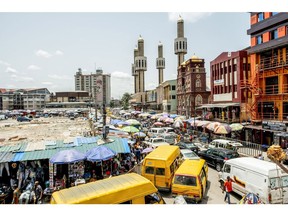 Heavy traffic surrounds the roads by a market in Lagos, Nigeria, on Friday, April 22, 2022. Choked supply chains, partly due to Russia's invasion of Ukraine, and an almost 100% increase in gasoline prices this year, are placing upward price pressures on Africa's largest economy. Photographer: Damilola Onafuwa/Bloomberg