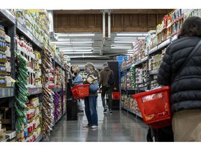 Shoppers inside a grocery store in San Francisco, California, U.S., on Monday, May 2, 2022. U.S. inflation-adjusted consumer spending rose in March despite intense price pressures, indicating households still have solid appetites and wherewithal for shopping.