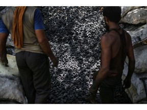 A stack of coal at a coal wholesale market in Mumbai, India, on Thursday, May 5, 2022. Production of coal, the fossil fuel that accounts for more than 70% of India's electricity generation, has failed to keep pace with unprecedented energy demand from the heat wave and the country's post-pandemic industrial revival.