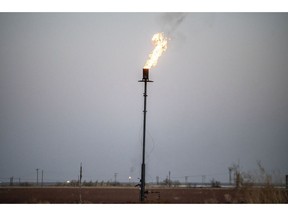 A gas flare stack at an oil well in Midland, Texas, US, on Thursday, April 7, 2022. Midland, Texas, is used to booms and busts. But even here, prices are shocking the local economy -- and the Fed may not be able to help.