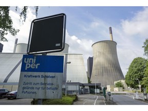 Signage for Uniper SE at an entrance to the Scholven coal-fired power plant in Gelsenkirchen, Germany, on Saturday, May 21, 2022. S&P Global Ratings last week downgraded Uniper to the lowest investment grade level, a move that could prompt lenders to restrict access to credit and peers to demand more collateral to back trades.