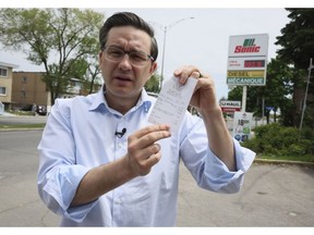 Pierre Poilievre highlights the soaring price of gas during a campaign stop in Laval, Quebec on May 24.